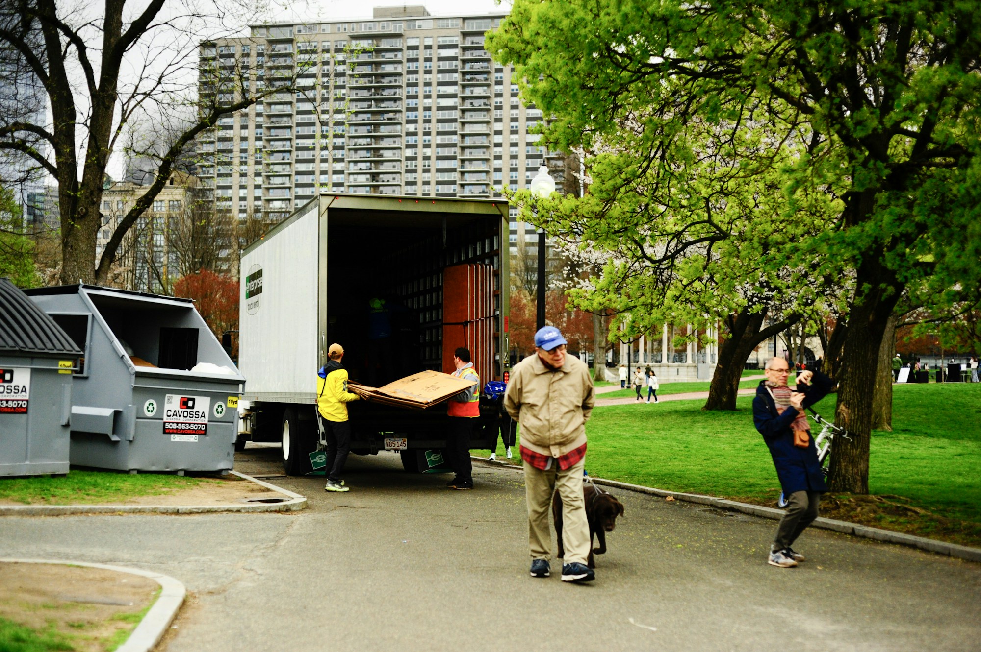 People unloading furniture from a moving truck